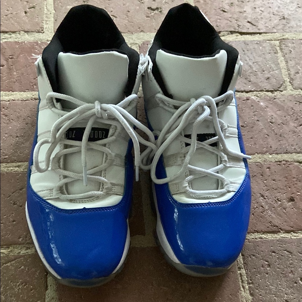 Air Jordan Faux Retro 11 Low Top Leather/ Patent Leather- Blue and White